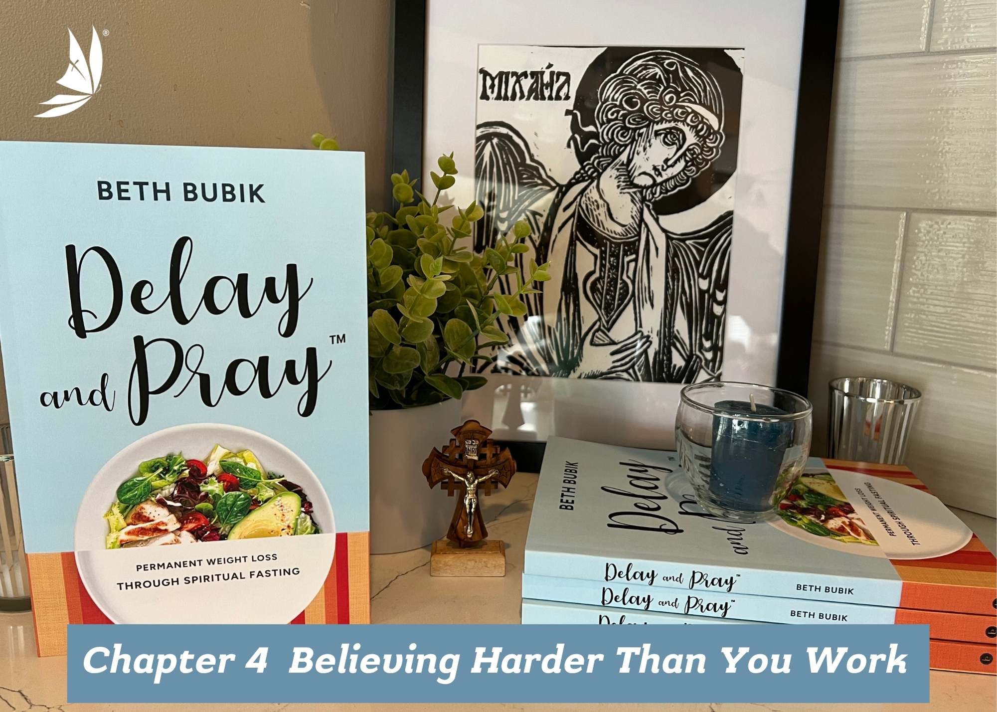 133 - Chapter 4 Believing Harder Than You Work Woman with outstretched arms on a mountain peak facing snow covered mountaintops and clouds.